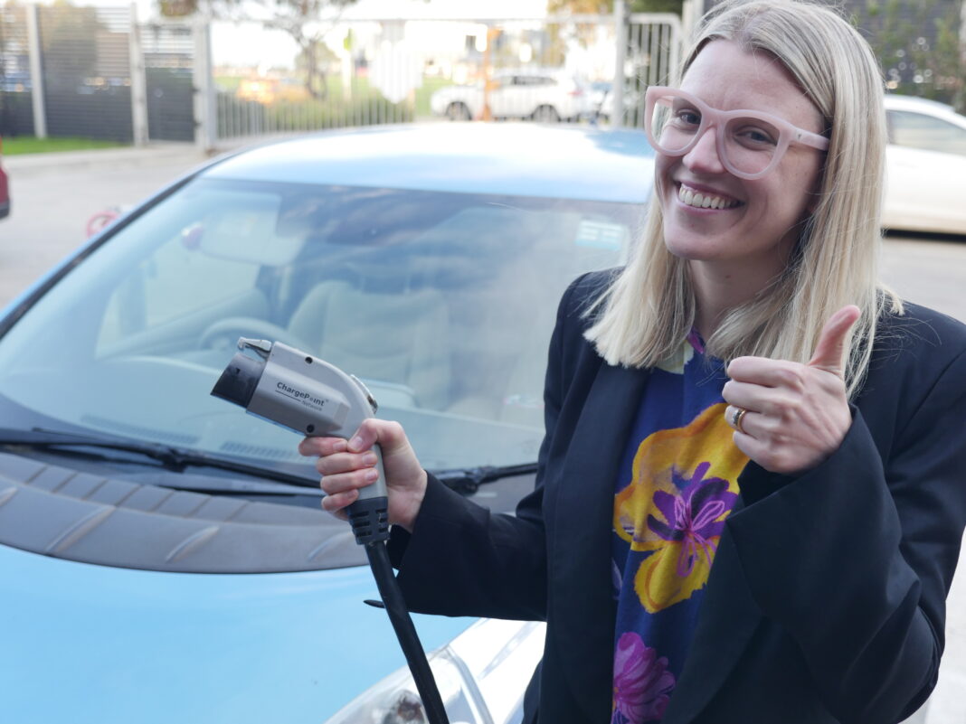 Cr Kate Gazzard with EV charger