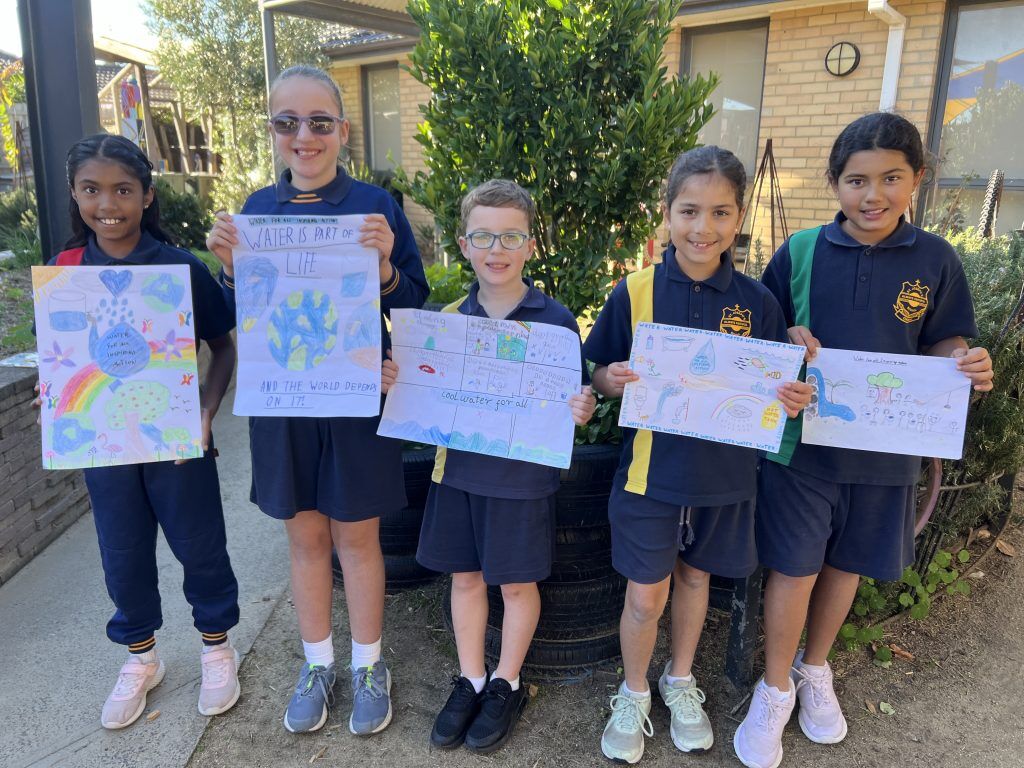 St Josephs Catholic Primary School students with National Water Week poster competition entries 1024x768 1